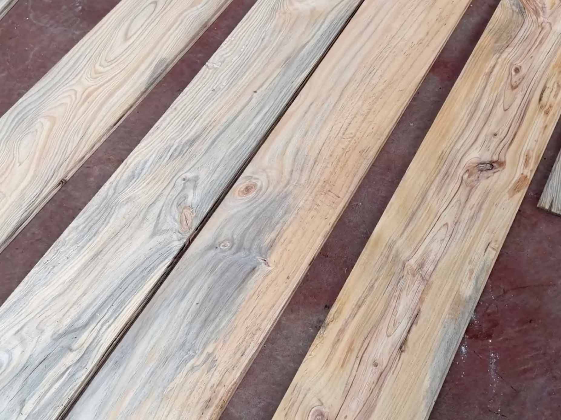 Board selection: the lumber varies a lot in color, grain, and knot pattern, so we sorted through them before anything went down.
